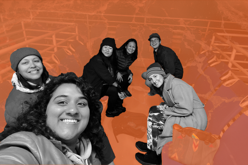 A black and white processed photo with an orange background of a group of people on a ferry