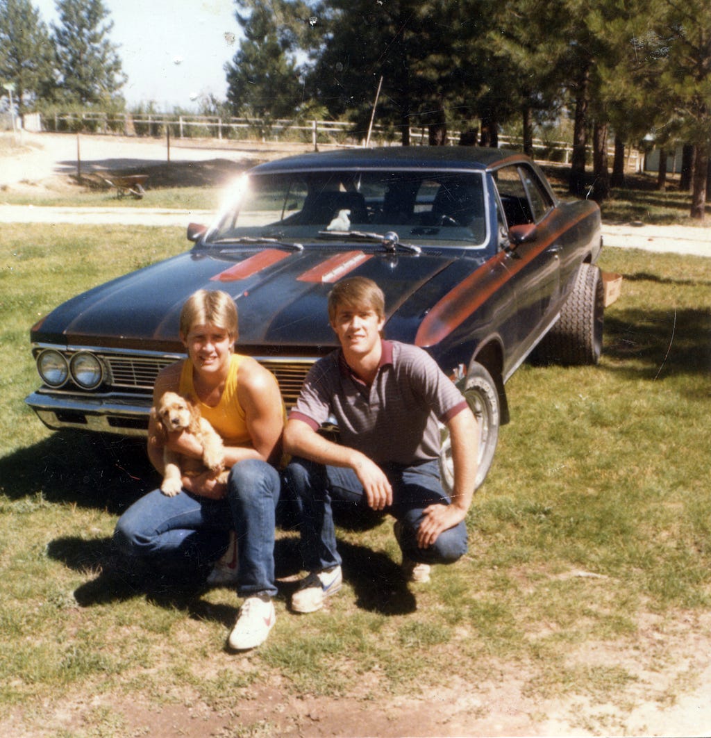 Joseph Openshaw (left) and Sean Openshaw pose in front of Sean’s 1966 Chevelle SS in this 1985 photo.