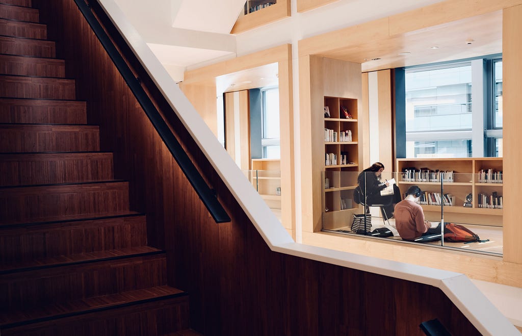 Students preparing for classes in the library