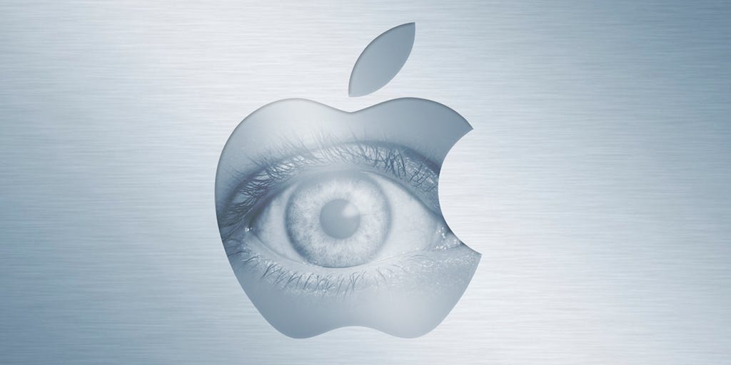 Pictured: Grey scale photos of an eye behind the shape of the Apple corporate logo.