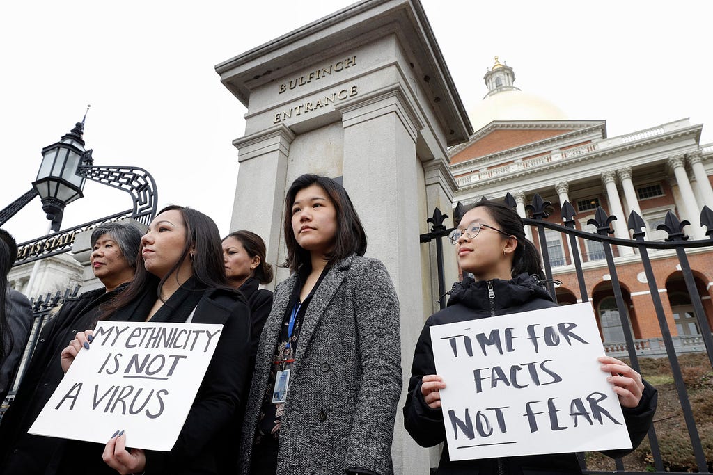 International students protest xenophobic policy on a college campus.