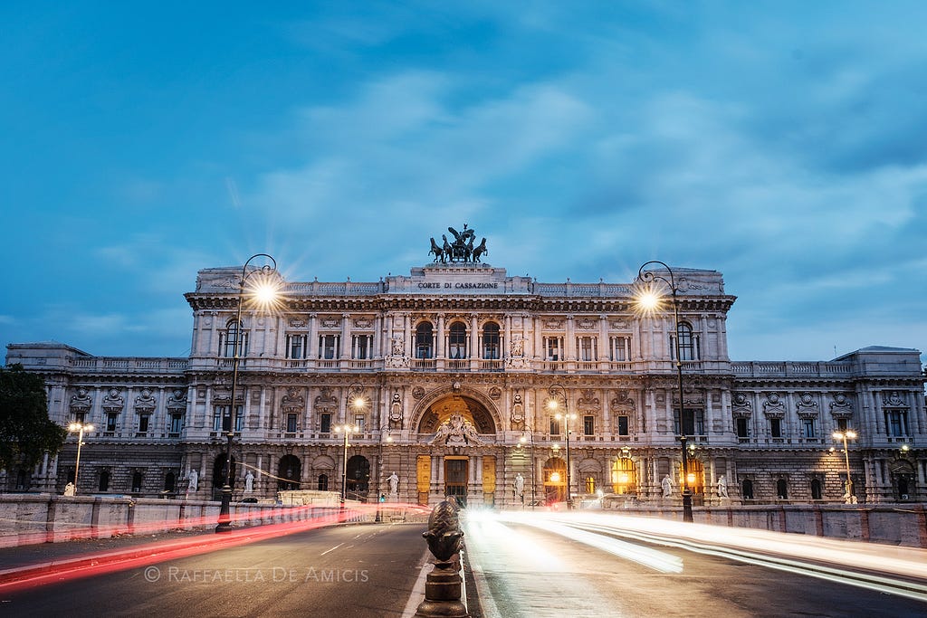 Rome, Italy’s supreme court (Corte di Cassazione) captured with light trails in the blue hour before dawn