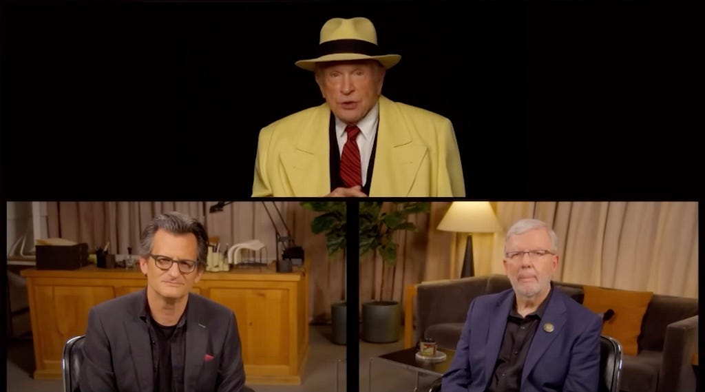 Warren Beatty dressed as Dick Tracy in a zoom call