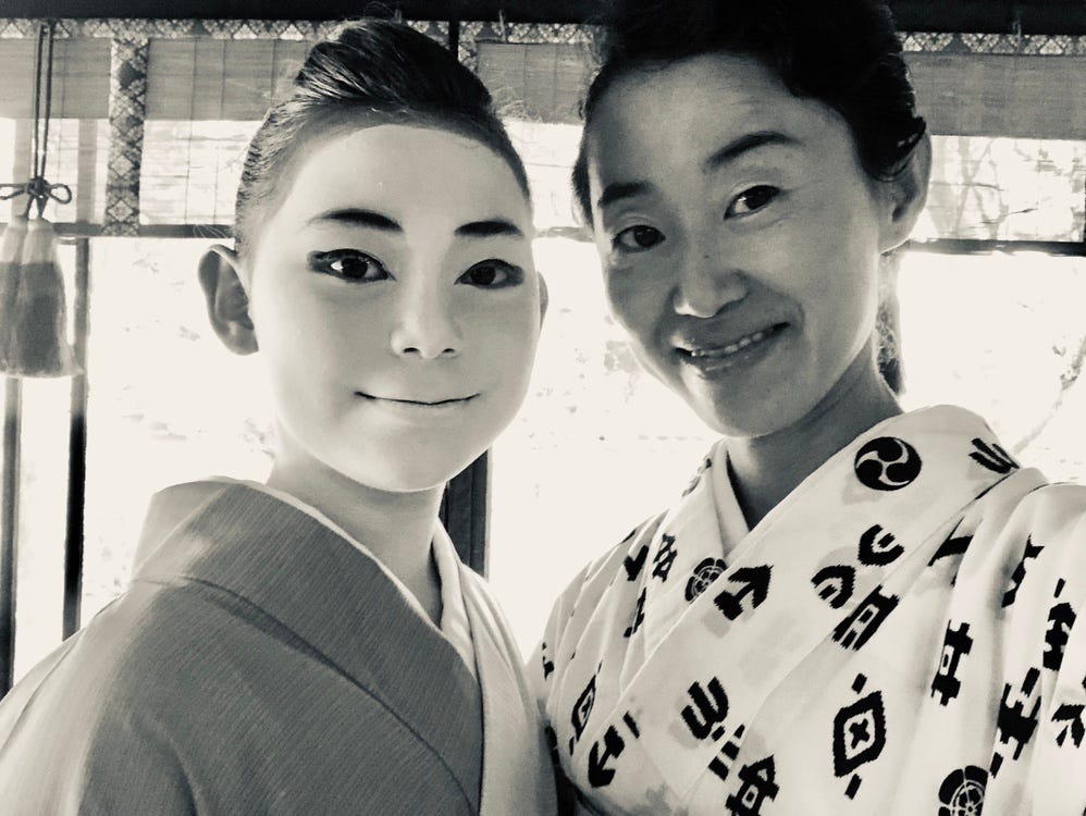 Mother and Daughter portrait in traditional kimono for celebration ceremony.