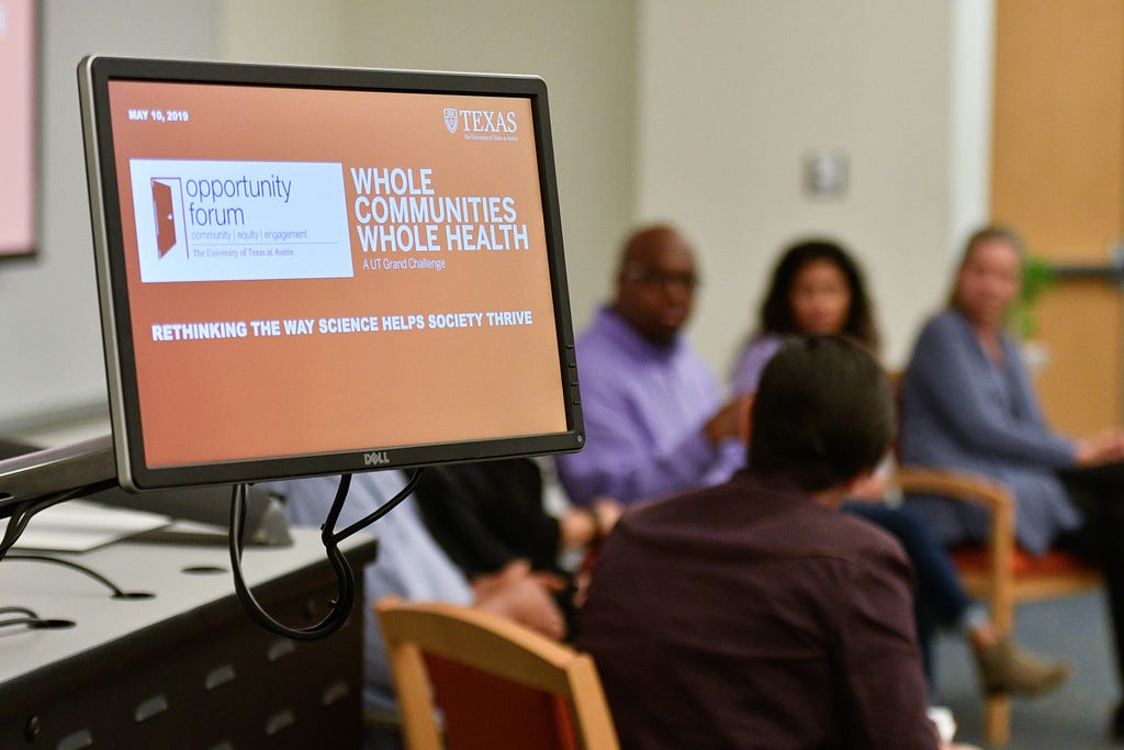 Whole Communities–Whole Health researchers and community advisors sit together on an Opportunity Forum panel.