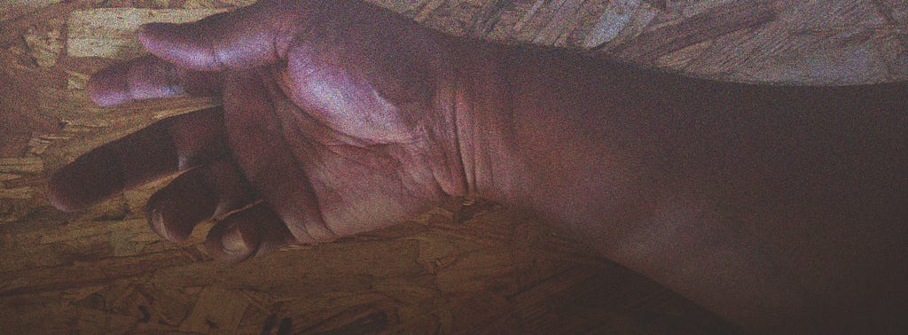 Hand and forearm of a brown skinned person