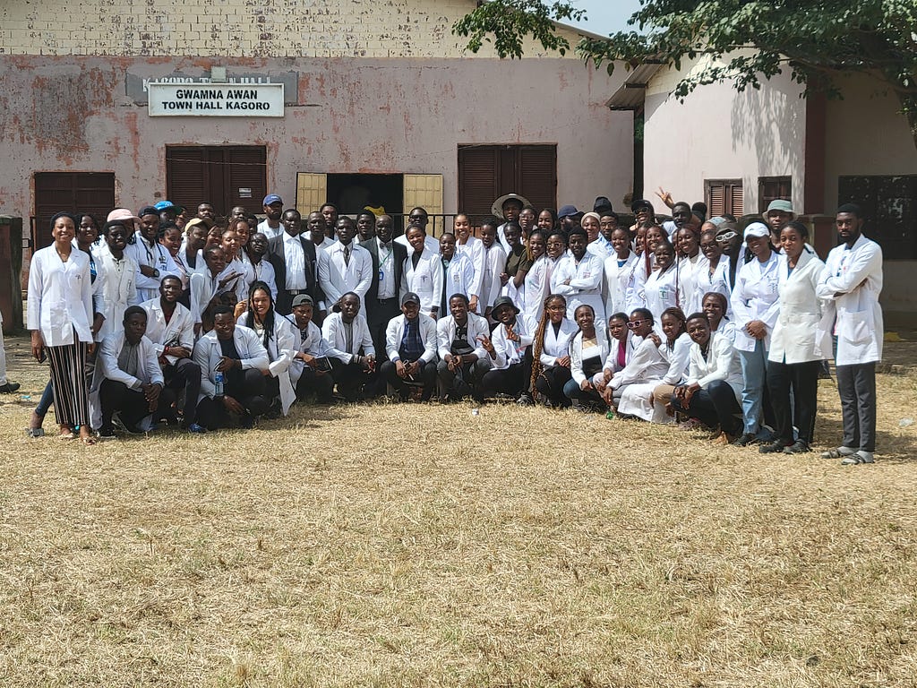 My classmates and I pose for a picture in front of Gwamna Awan Townhall Kagoro together with the provost of our medical school.