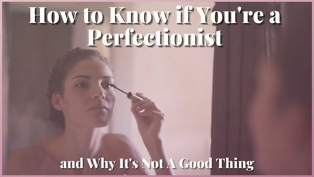 Woman looking in the mirror putting on makeup How to know if you’re a Perfectionist and why it’s not a good thing