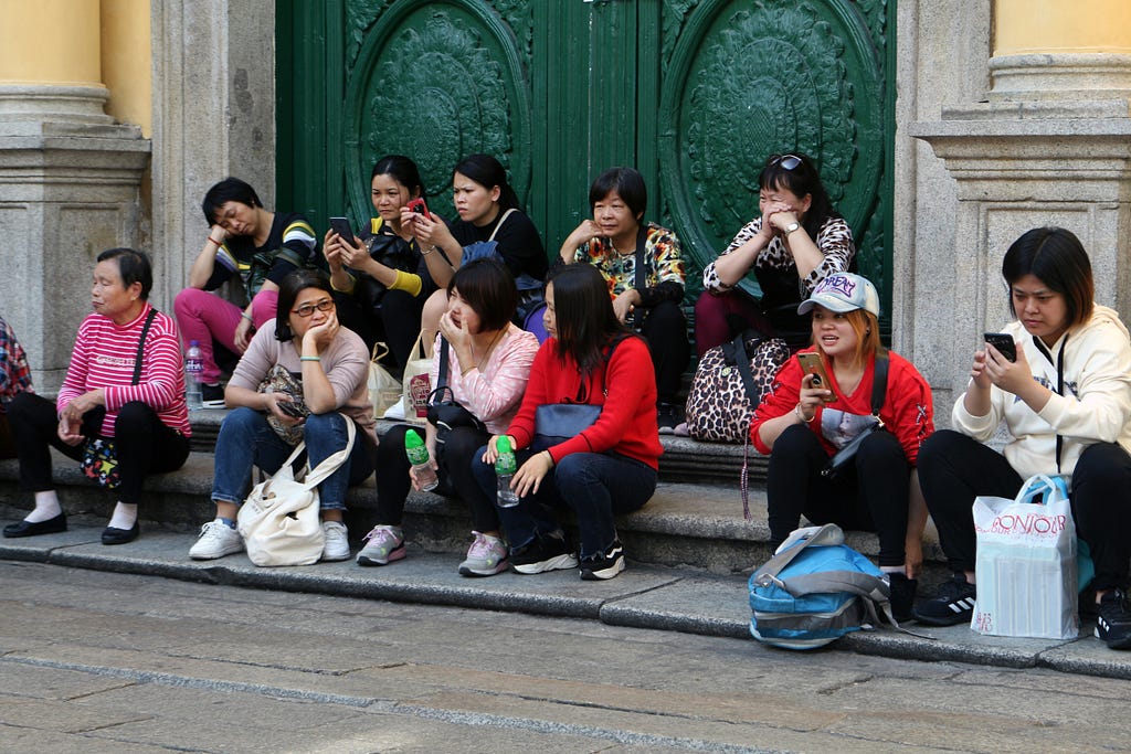 People from different demograph sitting together