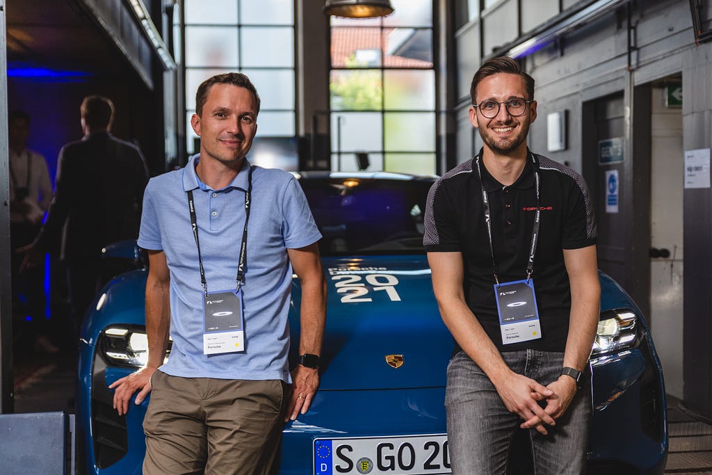 Manfred Wiedemann and Martin Meinzer, both working for the Porsche Connect Partner Services project team.