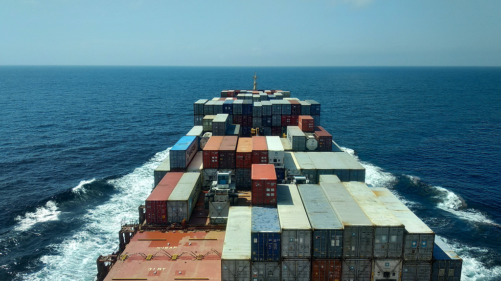 Picture of a container ship sailing on sea