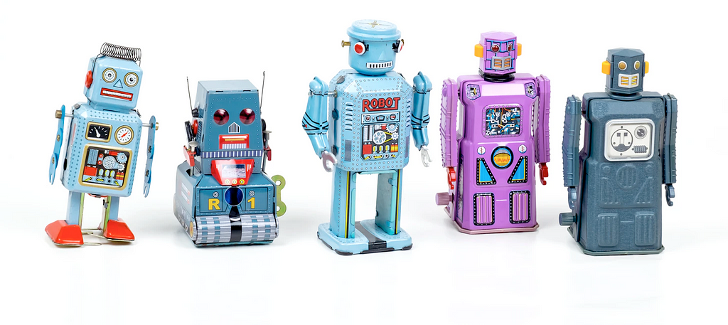 Little toy robots, collection of blue and pink colored