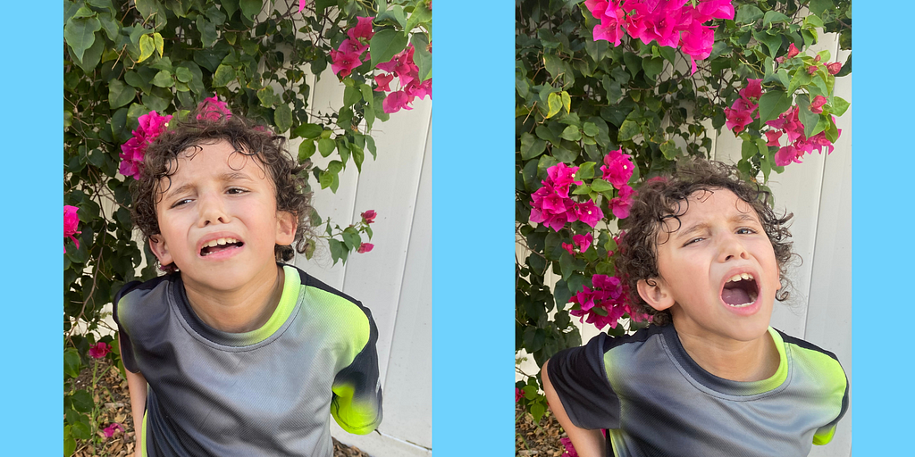 Image of my son Anthony wearing a black and green shirt crying in front of pretty flowers because he does not want to go inside from playtime.