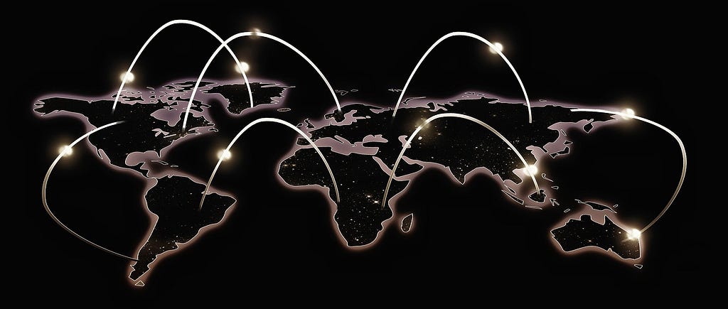 Map of the world showing the seven continents against a black background with white lines pointing to various AWS regions