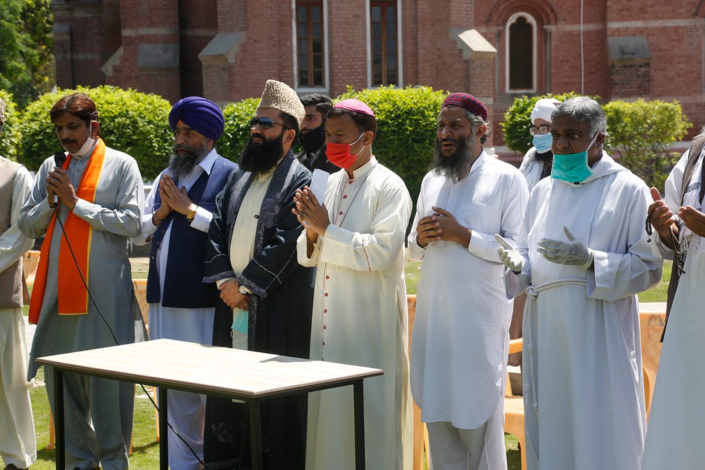 Pakistan Interfaith activists attend inter-religious prayers to express solidarity with Covid-19 victims, at a church in Lahore, Pakistan, April 20. (AP Photo/K.M. Chaudhry)