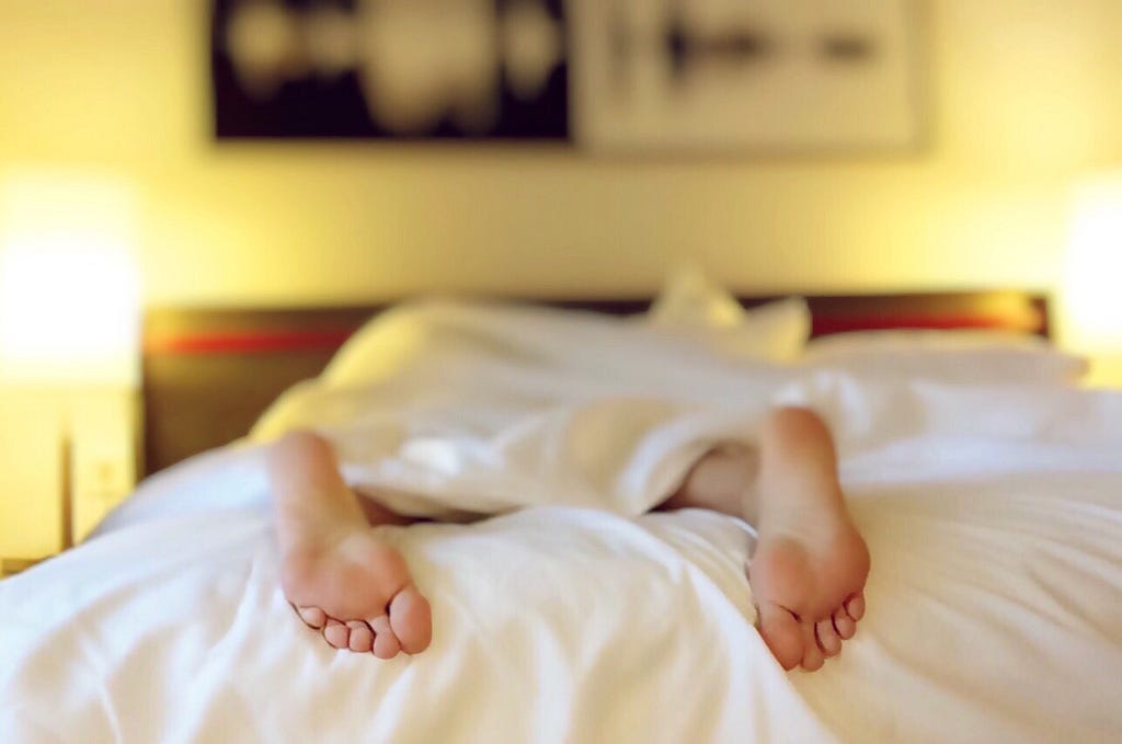 feet sticking out of bed perfectionist