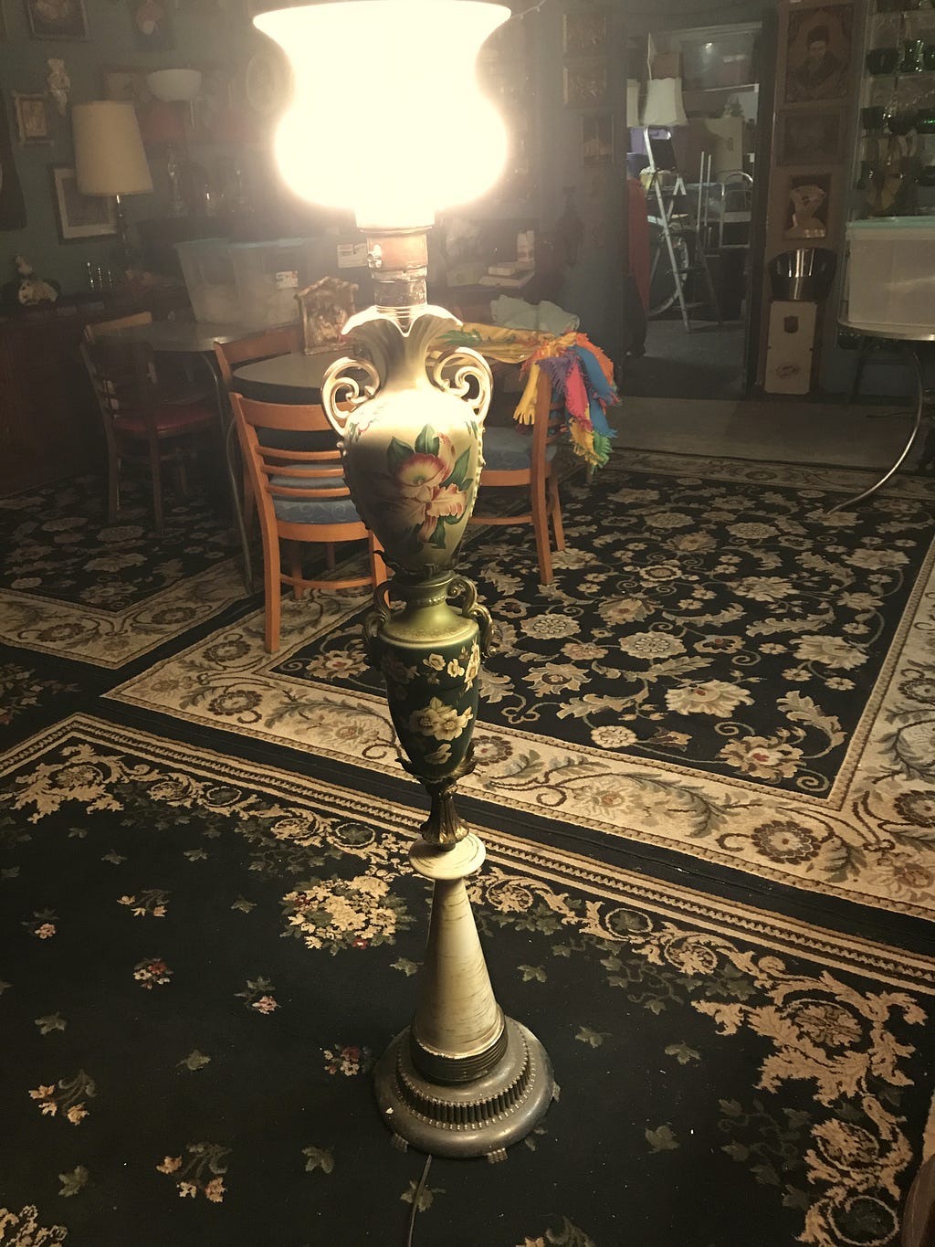 A torchier a Made from various unsold lamps that stacked together