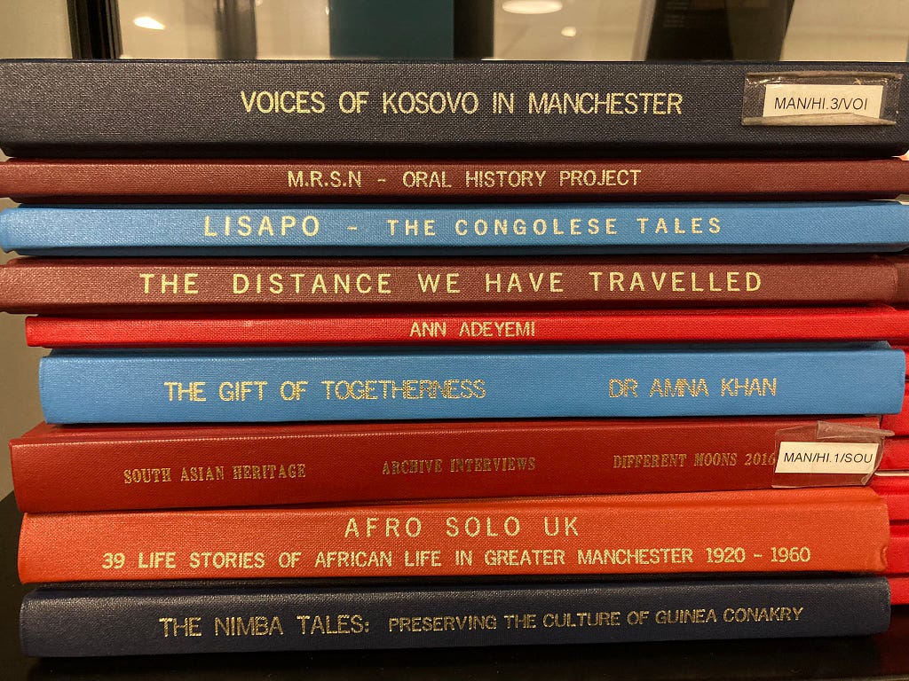 Bound volumes on a library shelf