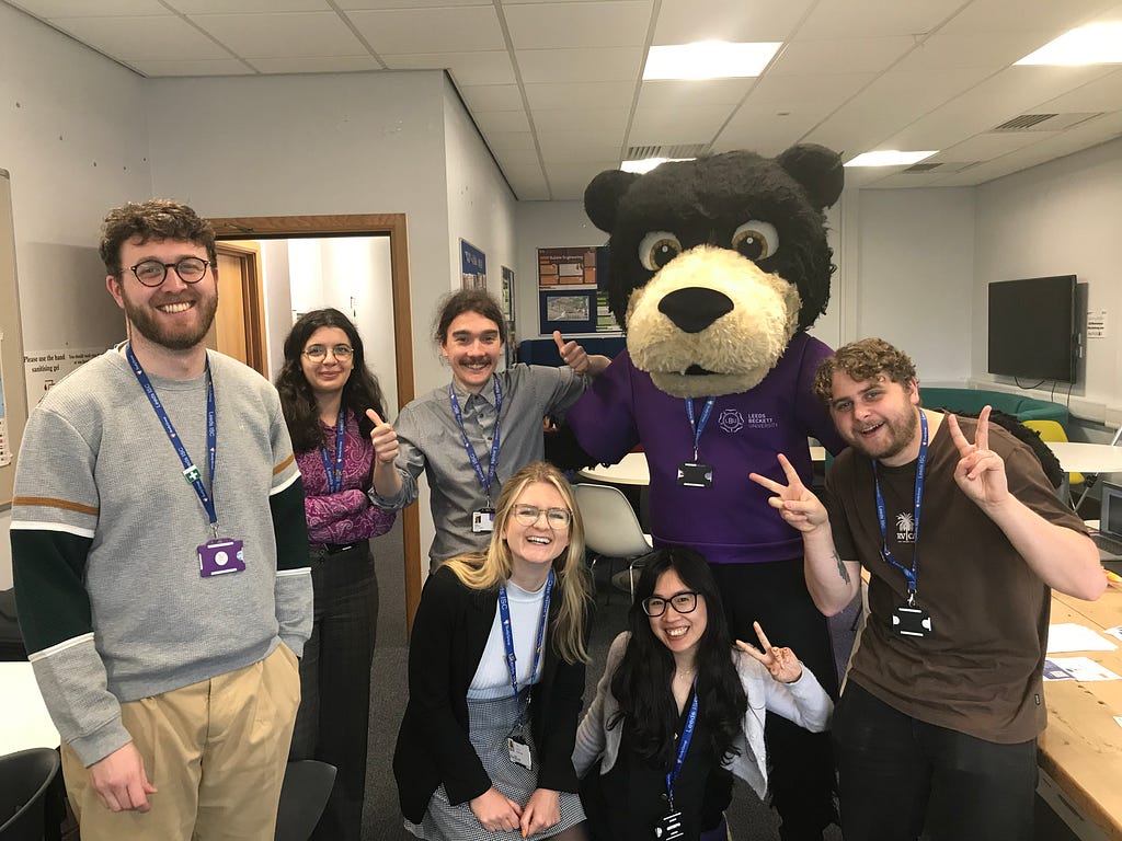 Photograph of Beckett Bear with Members of the LISC Student Support Team