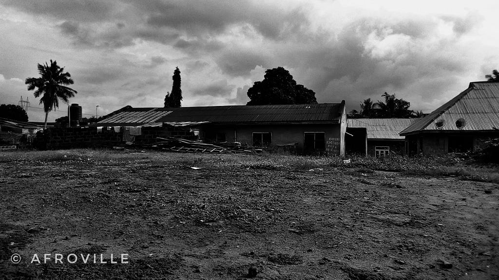 A black-and-white landscape picture with grey clouds in the sky.E.g.