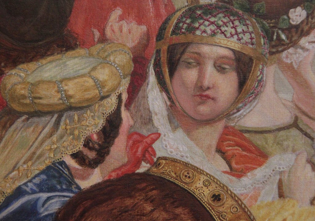 Medieval noble woman looks down at another woman.