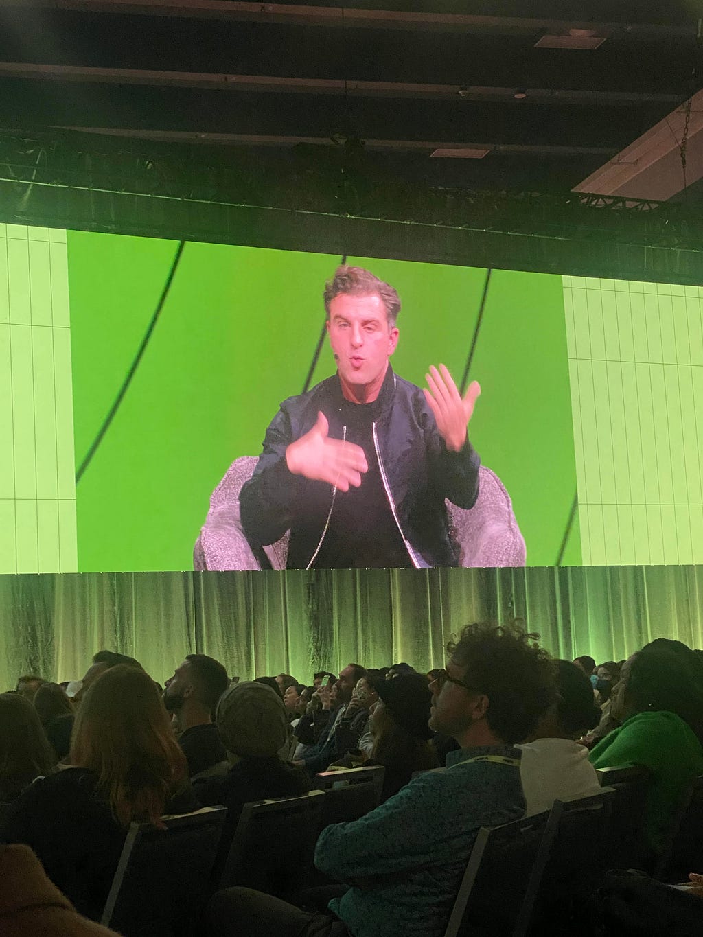 Airbnb CEO Brian Chesky speaking in a conversation with Figma CEO Dylan Field