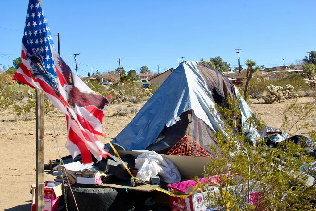 An assumedly homeless camper in Joshua Tree, CA