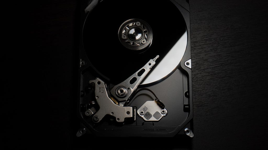 What are the legal and regulatory requirements for hard drive destruction?