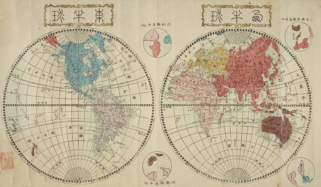 Map of the world in two hemispheres. The text is in Japanese.