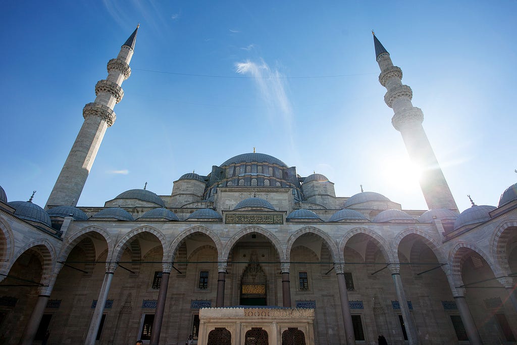 a mosque rising up from out of the frame