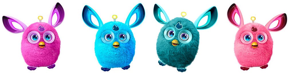 A bunch of fluffy and colourful Furbies looking cute, but we all know they would try to kill us in our sleep.