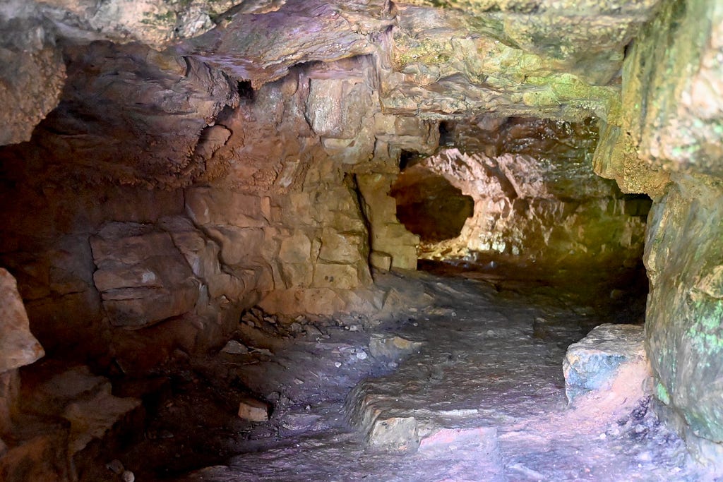 Interior of a terracotta limestone cave at Maribel Caves.