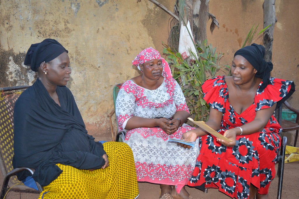 In her neighborhood, Mama Diancoumba discusses and advises other women on the health issues.