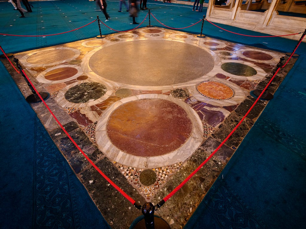 At the heart of Hagia Sophia, lies the Omphalion, a circular marble floor with an intricate design.