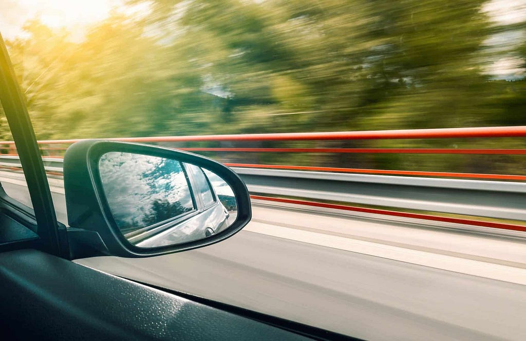 Looking out window of a moving vehicle