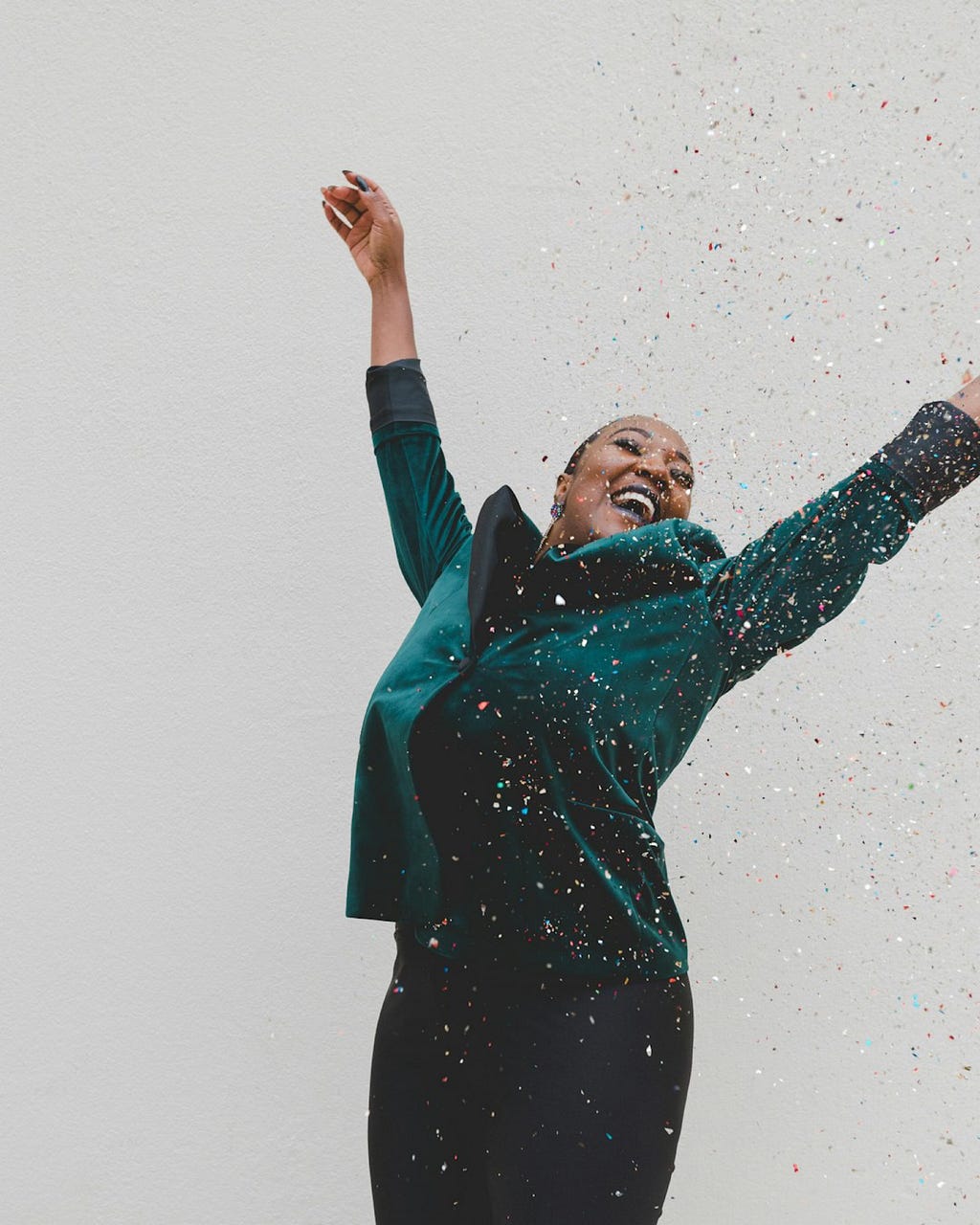 a woman jumping for joy