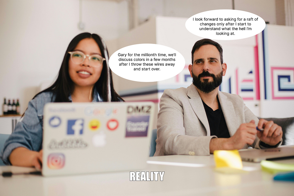 Man and woman behind a computer discussing a wireframe