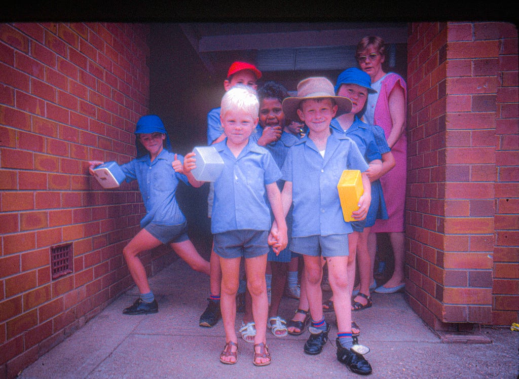 Australian students in a line and one out of place