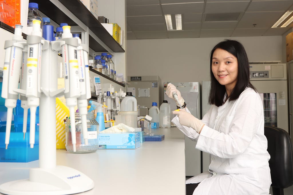 Dr. Carmen Wong working at the HKUMed research lab