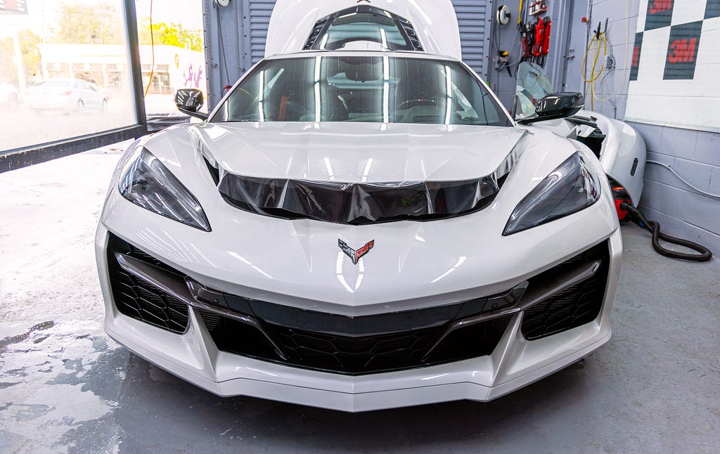 3M Gloss PPF being installed on the hood of a 2023 Corvette Z06 by Pro Tint of Florida in Orlando