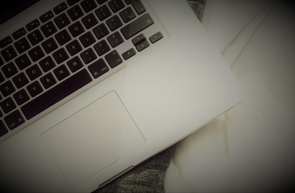 vignette style photo of a laptop keyboard