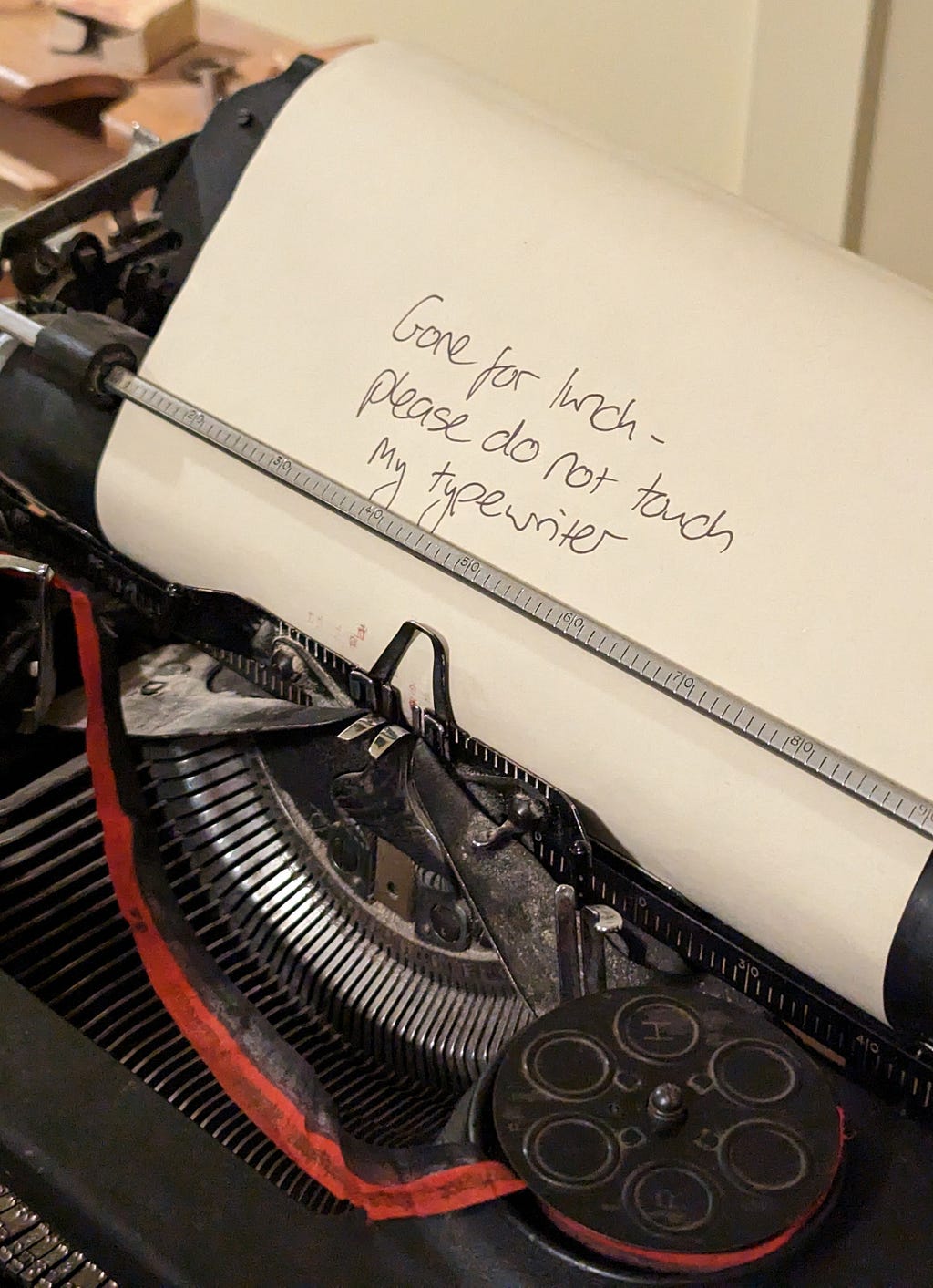 Alan Turing’s typewriter — a handwritten note says “Gone for lunch — please do not touch my typewriter”