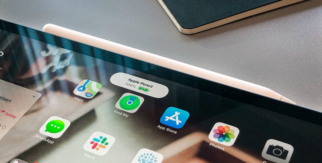 iPad Pro with an Apple Pencil snapped to the side