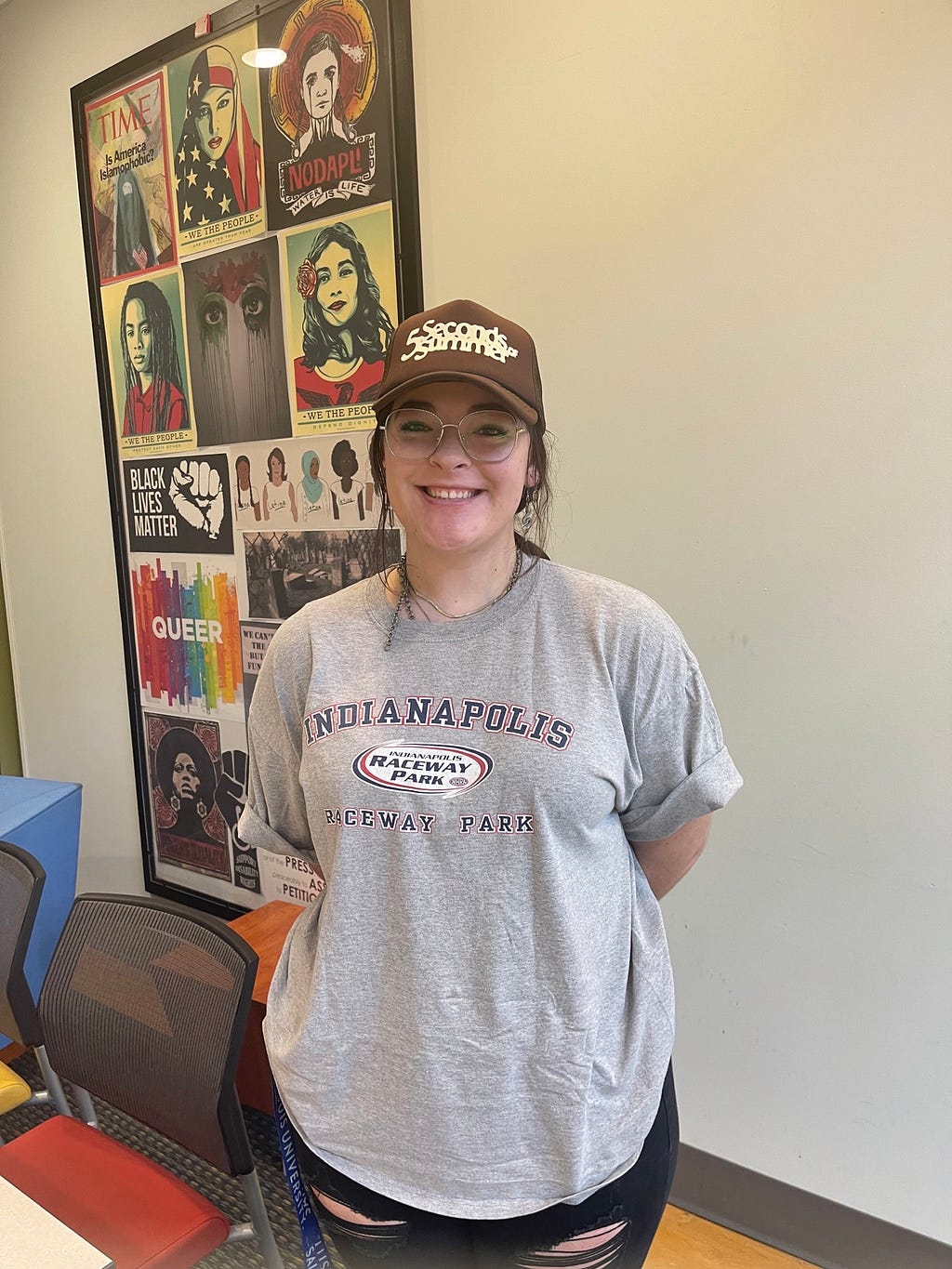 Grace Wilken, senior at Saint Louis University, standing and smiling in the Center for Global Citizenship on Saint Louis Universities’ campus on September 1st, 2022 at 11:30 am. Photo by Lauren Morby