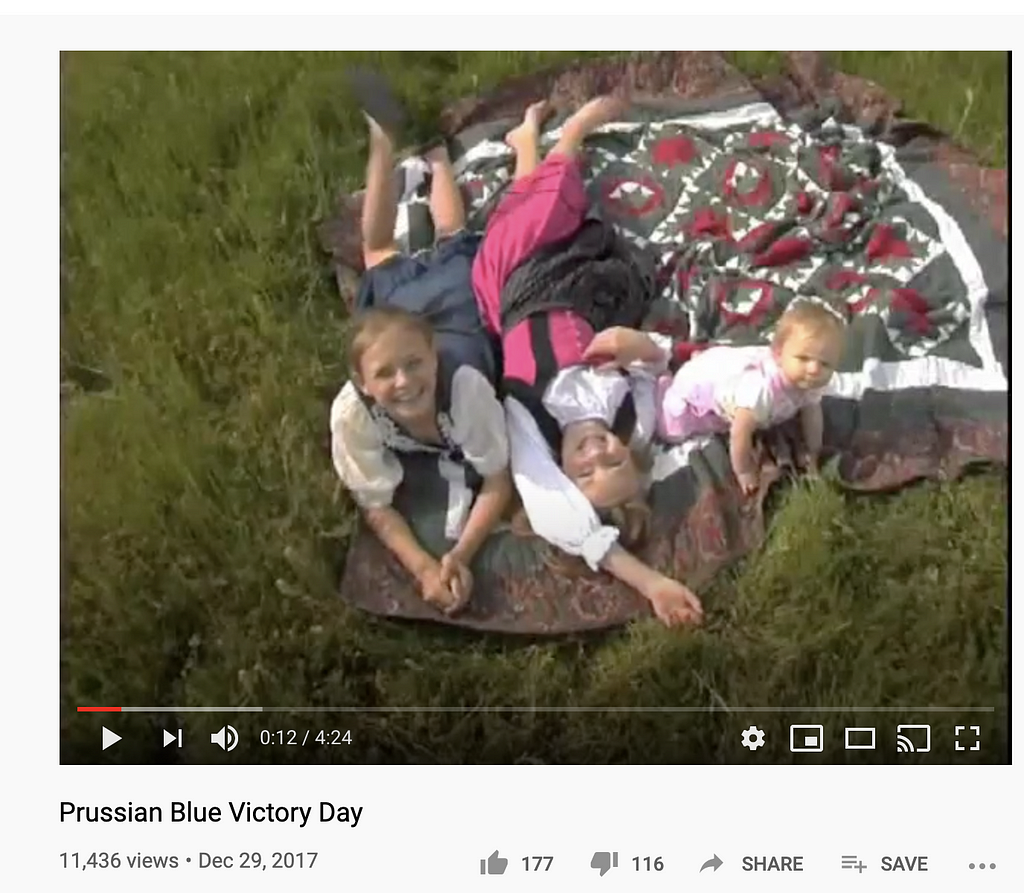 Screenshot of the video for “Victory Day” by Prussian Blue on YouTube. The song celebrates a “purging” of non-white people.