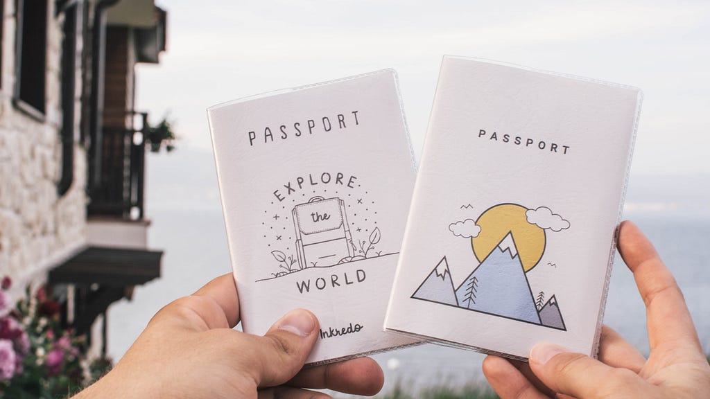 Fancy passports held in hands