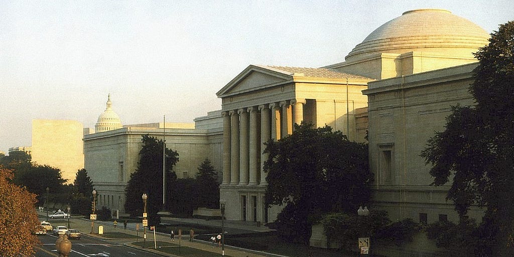 NationalGallery of Art, West Building, Washington, DC. (Source: Wikimedia Commons). Streetscape of a large domed, Neo-classical building.