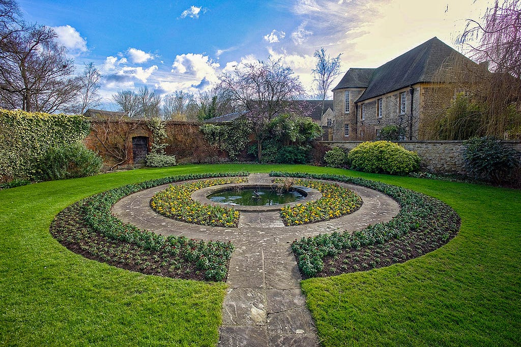 a circular garden with a path leading into the circle