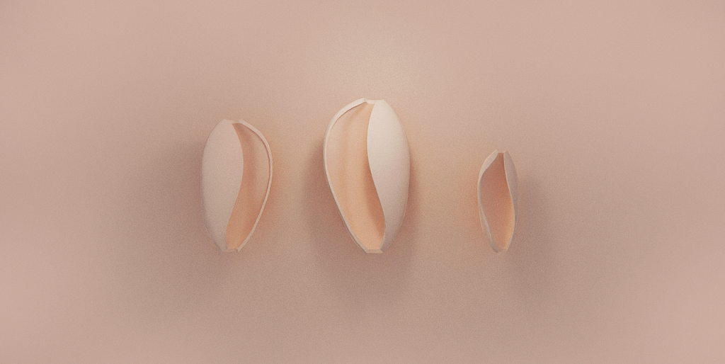 Three light pink abstract 3d oval objects similar to shells on a beige background. They all have a curved soft shape and they are in three different sizes.