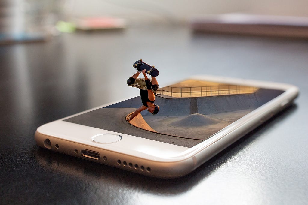sport skating halfpipe out of an iphone, taking action with knowledge